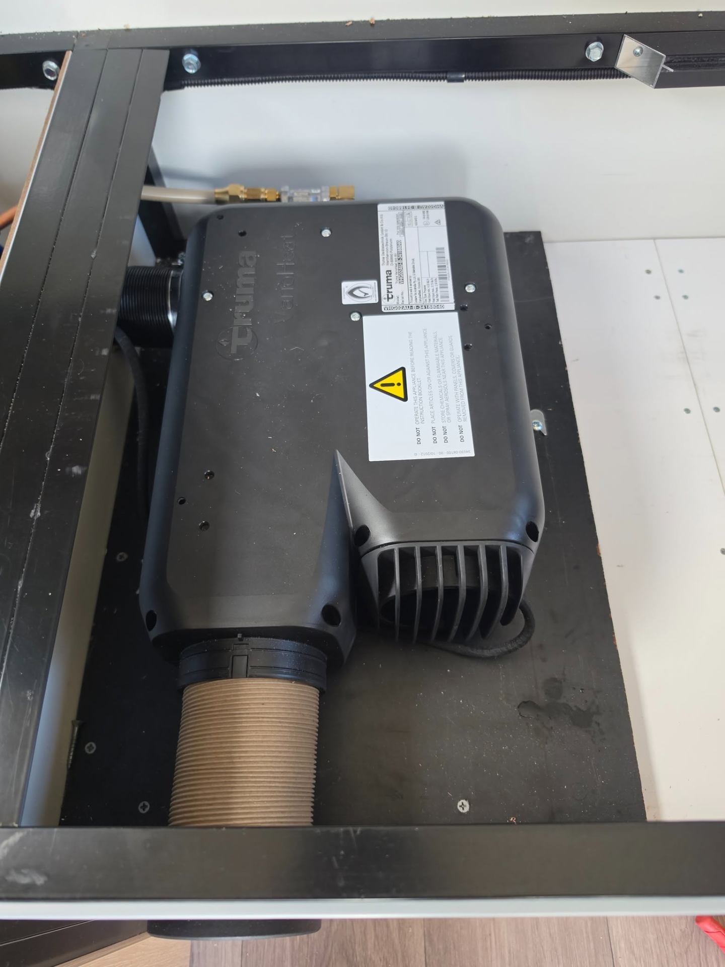 Truma RV heater and appliance unit installed